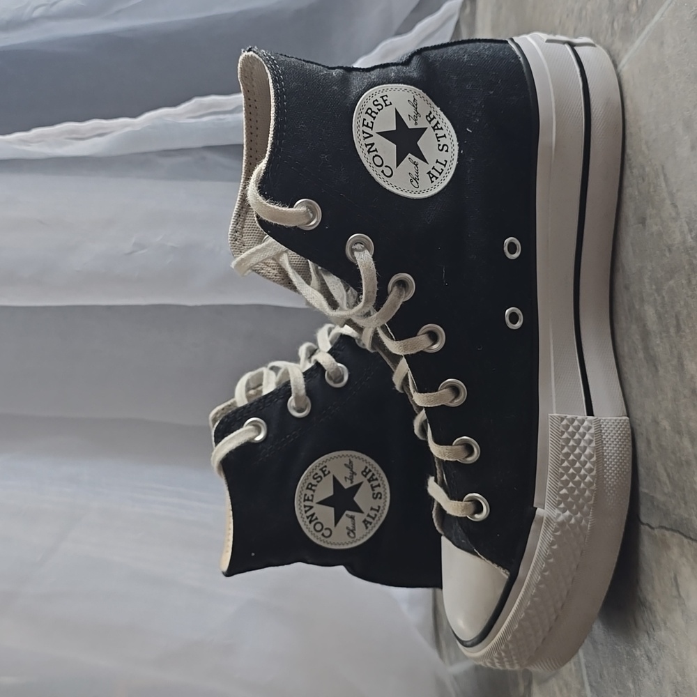 Converse Chuck Taylor All StarLift High Tops.